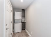 Thumbnail 36 of 39 - Stacked washer and dryer in Riata Park apartment