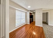 Thumbnail 10 of 24 - floor living space with large windows – Borders Apartments Brownsville TX