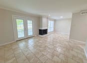 Thumbnail 1 of 19 - Spacious living room in a Sierra Ranch apartment home in San Antonio, TX.