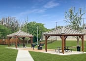 Thumbnail 8 of 17 - Picnic pavilion with BBQ grills and shaded seating area