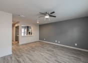 Thumbnail 23 of 30 - Spacious living room with modern finishes and ceiling fan
