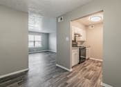Thumbnail 4 of 17 - Dining area with plank flooring and open-concept layout