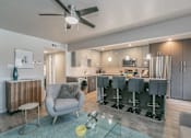 Thumbnail 1 of 30 - open-concept living room and kitchen in Dallas apartment at Reserve on Abrams