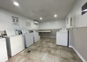 Thumbnail 11 of 11 - the laundry room is equipped with washes and dryers