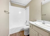 Thumbnail 27 of 28 - Bathroom with tiled shower and vanity storage at Verano Oaks Apartments in Hurst
