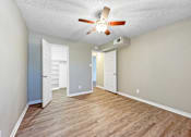 Thumbnail 26 of 28 - Bedroom with closet doors and light neutral walls in Verano Oaks Apartments