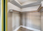Thumbnail 19 of 20 - a room with white walls and a wooden floor