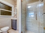 Thumbnail 18 of 20 - a bathroom with a toilet sink and shower