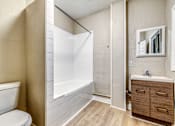 Thumbnail 16 of 20 - a bathroom with a bathtub and a sink