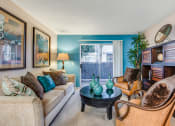 Thumbnail 13 of 29 - a living room filled with furniture and a large window
