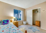 Thumbnail 19 of 29 - a bedroom with a bed and two night stands