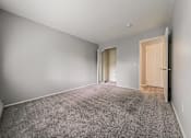 Thumbnail 23 of 49 - A room with grey carpet and white walls. at Integrity Berea Apartments, Ohio