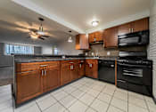 Thumbnail 22 of 49 - Modern Kitchen at River Run Apartments, Warren, 44485