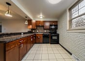 Thumbnail 21 of 49 - Spacious Kitchen at River Run Apartments, Warren, OH