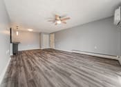 Thumbnail 3 of 49 - A room with a ceiling fan and wood flooring. at Integrity Berea Apartments, Apartments, Berea, OH