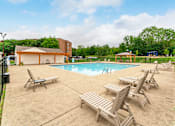 Thumbnail 18 of 39 - Poolside Relaxation Area at Renova of Brunswick Apartments, Brunswick, Ohio