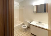 Thumbnail 15 of 22 - Bathroom at Woodland Pointe Apartments and Townhomes, Integrity Realty, Kent, 44240