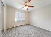 Thumbnail 8 of 21 - Bedroom with a ceiling fan at Integrity Chardon Apartments,Ohio