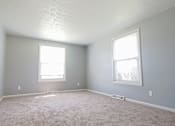 Thumbnail 47 of 49 - A room with two windows and carpeted floor. at Integrity Berea Apartments, Berea, OH, 44017
