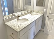 Thumbnail 48 of 49 - A bathroom with a sink and mirror. at Integrity Berea Apartments, Berea, Ohio