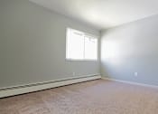Thumbnail 36 of 49 - A room with a window and carpeted floor. at Integrity Berea Apartments, Berea, Ohio