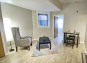Thumbnail 3 of 9 - Living Room With Dining Area at Tremont Terraces Apartments, Integrity Realty LLC, Cleveland, OH