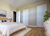 Thumbnail 15 of 35 - A bedroom with a large bed and a painting on the wall Integrity Realty, Cleveland, OH, 44120