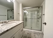 Thumbnail 36 of 42 - Updated bathroom with glass shower at Atrium in The Village, Beachwood Ohio