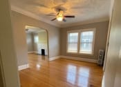 Thumbnail 18 of 32 - Living Room with High Ceiling at Integrity Gold Coast, Ohio, 44102