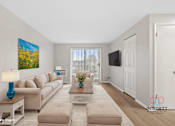Thumbnail 9 of 22 - Example of fully furnished living room.