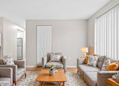 Thumbnail 4 of 22 - An example of a living room fully furnished.