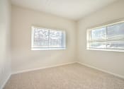 Thumbnail 28 of 42 - A room with two windows and carpeted floor t Atrium in The Village,  44122