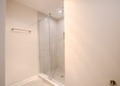 Thumbnail 33 of 42 - A white bathroom with a glass shower door t Atrium in The Village, Beachwood, OH 44122
