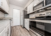 Thumbnail 4 of 46 - Stainless Steel Appliances at Hunt Club Apartments, Apartments, Copley, OH