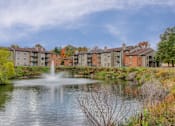 Thumbnail 1 of 46 - Lush grounds with pond  at Hunt Club Apartments, Copley, 44321
