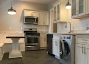 Thumbnail 29 of 37 - Fully Furnished Kitchen With Stainless Steel Appliances at Integrity Cleveland Heights  Apartments, Ohio, 44106