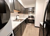 Thumbnail 7 of 39 - Modern Kitchen at Renova of Brunswick Apartments, Ohio, 44212
