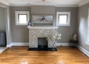 Thumbnail 20 of 32 - Decorative Fireplace at Integrity Gold Coast Apartments, Lakewood