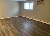 Thumbnail 15 of 25 - Plank Style flooring living room at Integrity Berea Apartments,  Integrity Realty LLC, Berea