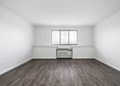 Thumbnail 5 of 15 - Alternate living room floor plan with plank-style flooring at Integrity Medina Apartments,  Ohio