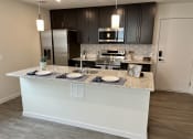 Thumbnail 7 of 18 - Large Island Kitchen at Reserve Overlook Apartments, Integrity Realty, Ohio, 44106