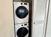 Thumbnail 11 of 18 - full size washer and dryer at Reserve Overlook Apartments, Integrity Realty, Cleveland Heights, OH, 44106