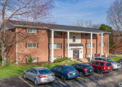 Thumbnail 3 of 14 - Typical building with ample parking at Ryan Place Apartments, Integrity Realty, Kent, Ohio