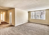 Thumbnail 12 of 35 - Carpeted Living Room at Shaker Collection  Apartments, Integrity Realty, Cleveland, OH, 44120