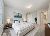 Thumbnail 8 of 36 - Example of a furnished townhome bedroom.
