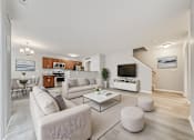 Thumbnail 5 of 36 - Example of a furnished townhome living room area.