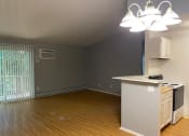 Thumbnail 22 of 25 - Kitchen with Living Room View at Integrity Berea Apartments, Berea, OH