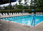 Thumbnail 41 of 42 - Community swimming pool with seating.at Atrium in The Village, Ohio