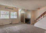 Thumbnail 5 of 22 - style 2 of vaulted living room at Woodland Pointe Apartments and Townhomes,  Integrity Realty, Ohio, 44240