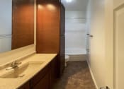 Thumbnail 16 of 22 - Renovated bathroom in select apartment homes at Woodland Pointe Apartments and Townhomes, Integrity Realty, Ohio, 44240